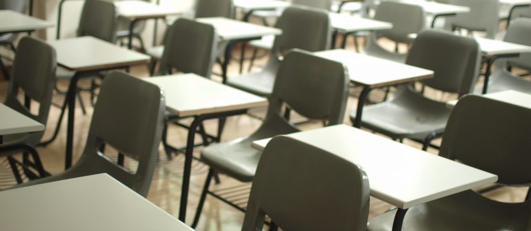 white table with black chairs