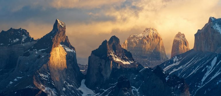 A group of mountains with snow on them